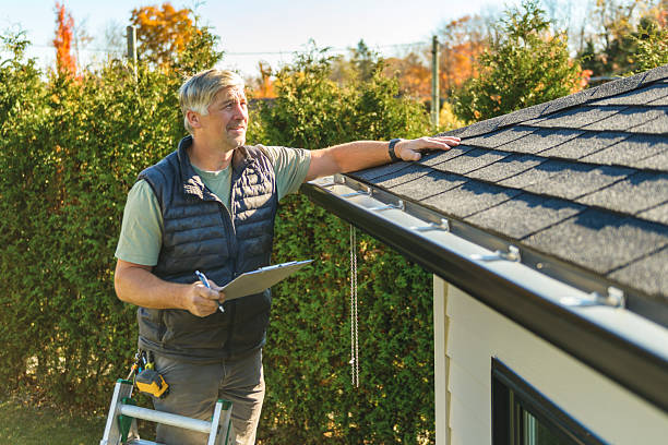 Professional Roofing technician working in Woodland, MS